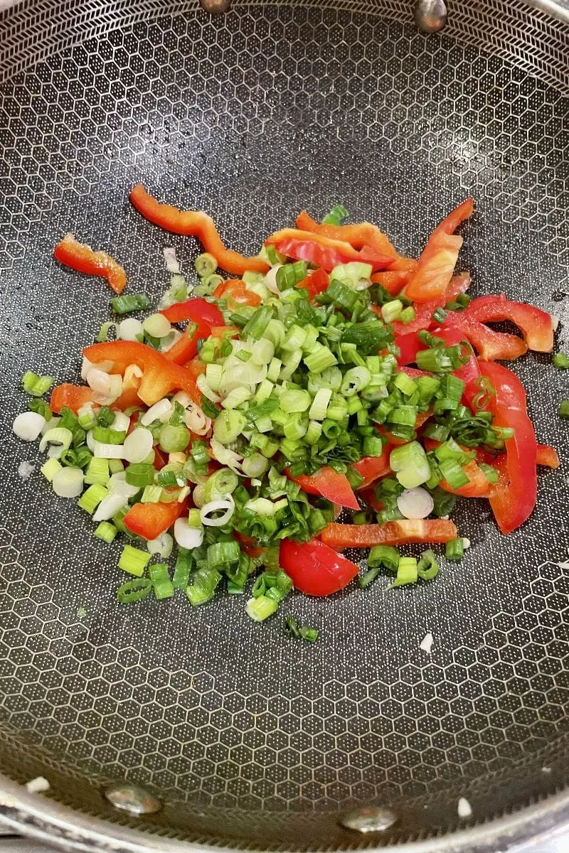 Stir frying vegetables.