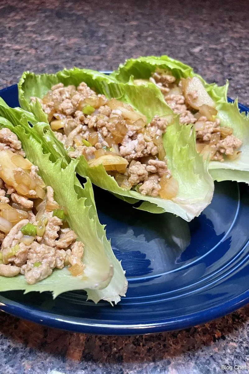 Prepared Asian lettuce wraps on plate.