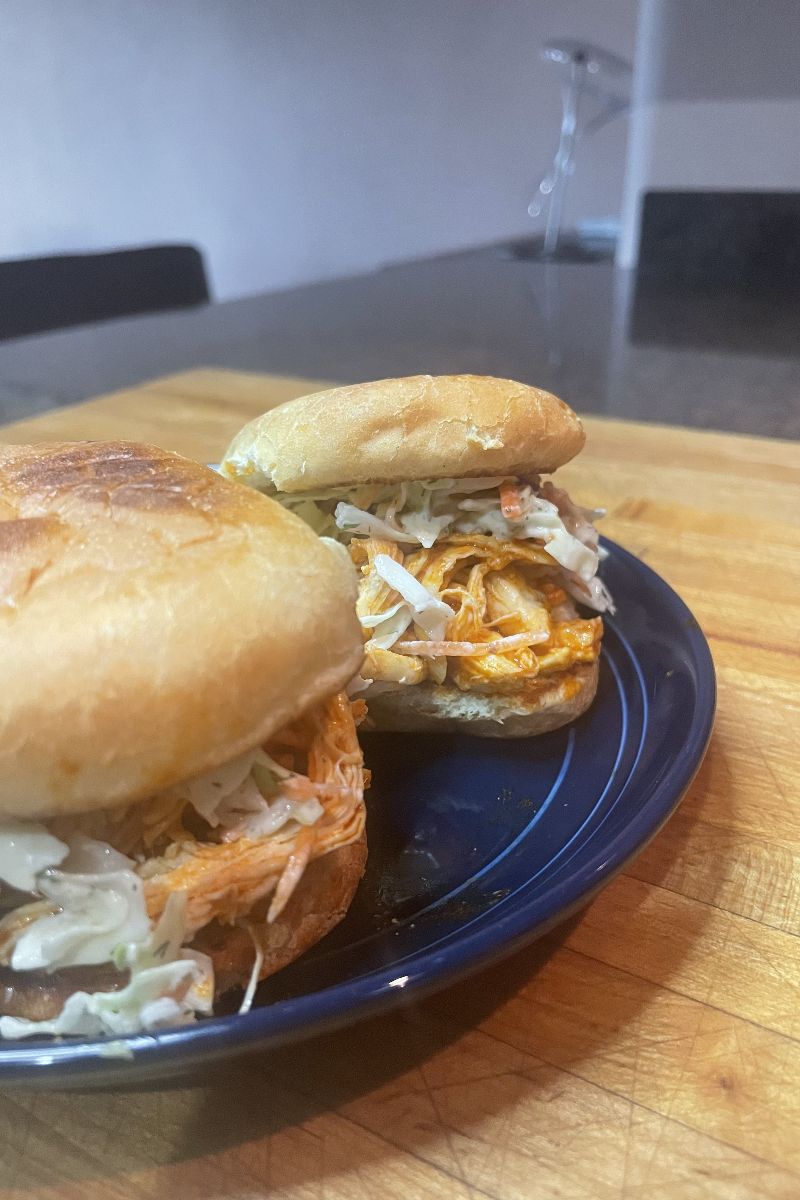 Close up view of buffalo chicken sliders.