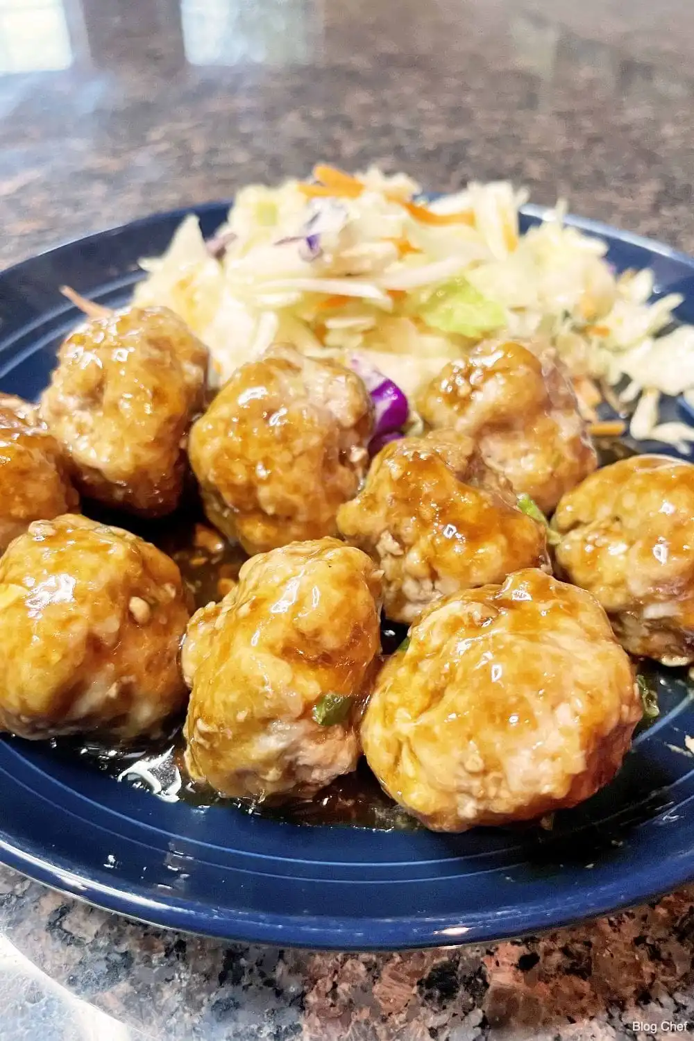 Hoisin Meatballs on blue plate. 