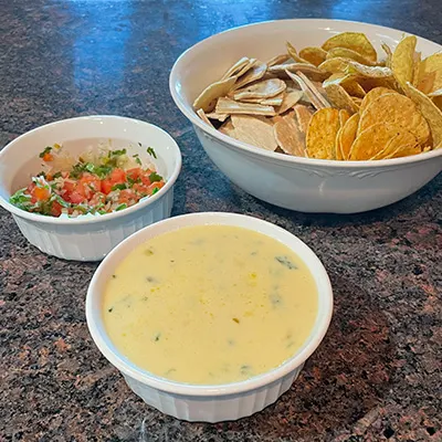 Close up view of Applebees queso dip.