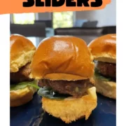 Chinese sliders prepared on plate with text overlay.