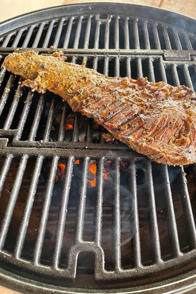 Skirt steak on grill.