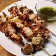 Grilled chicken skewers with roasted garlic vinaigrette.