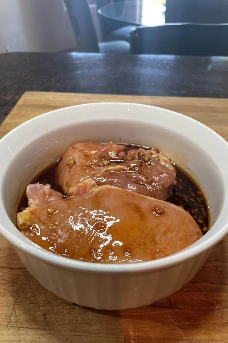 Pork chops marinating in Korean-style sauce.
