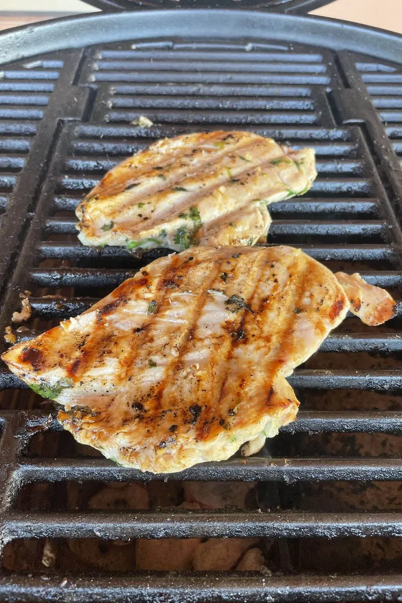 Marinated chicken grilling to serve with pineapple avocado salsa. 