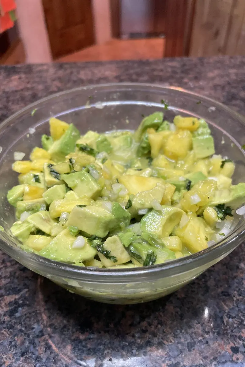 Pineapple avocado salsa in a bowl. 