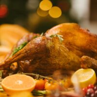 Roasted turkey on serving platter.