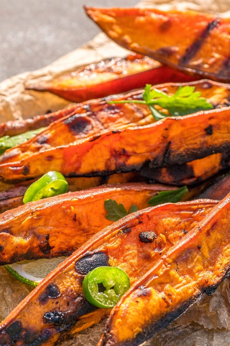 Grilled sweet potatoes on tray. 