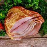 Top view of sliced ham, to represent how to cook uncured ham.
