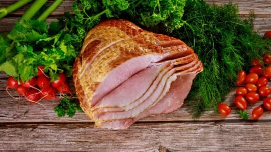 Top view of sliced ham, to represent how to cook uncured ham.
