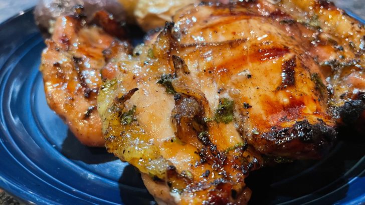 Close up view of grilled cilantro lime chicken thighs.