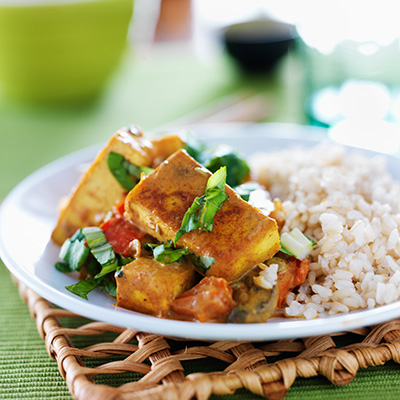 Tofu and rice on serving dish.