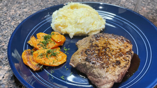 Home Chef meal of steak, mashed potatoes, and carrots on a plate.